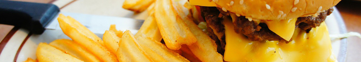 Eating American (Traditional) Burger at Ski Shores Cafe restaurant in Austin, TX.
